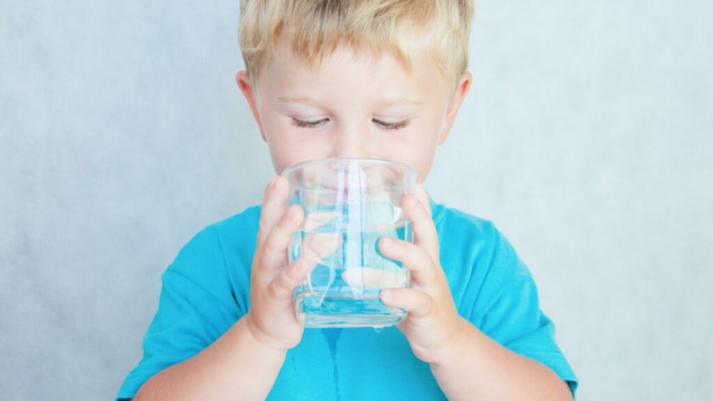 kid drinking water forever chemicals