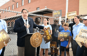 Rep Brennan speaking at UPS rally e1728695520885 - Bucks County Beacon - 2026 Primary Election Voter Guide