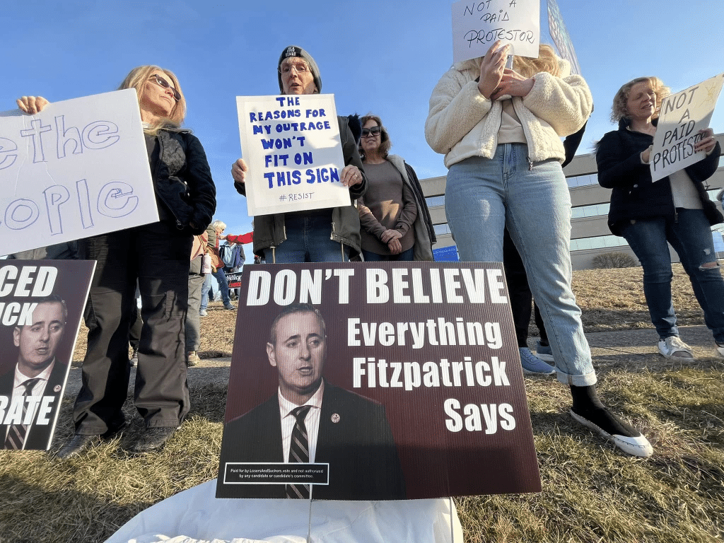 image 11 - Bucks County Beacon - Photo Essay: Bucks County Residents Protest Republican Congressman Brian Fitzpatrick for St. Patrick's Day