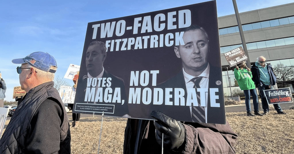 image 13 - Bucks County Beacon - Photo Essay: Bucks County Residents Protest Republican Congressman Brian Fitzpatrick for St. Patrick's Day