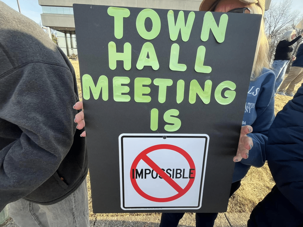 image 14 - Bucks County Beacon - Photo Essay: Bucks County Residents Protest Republican Congressman Brian Fitzpatrick for St. Patrick's Day