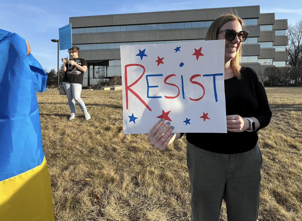 image 6 - Bucks County Beacon - Photo Essay: Bucks County Residents Protest Republican Congressman Brian Fitzpatrick for St. Patrick's Day